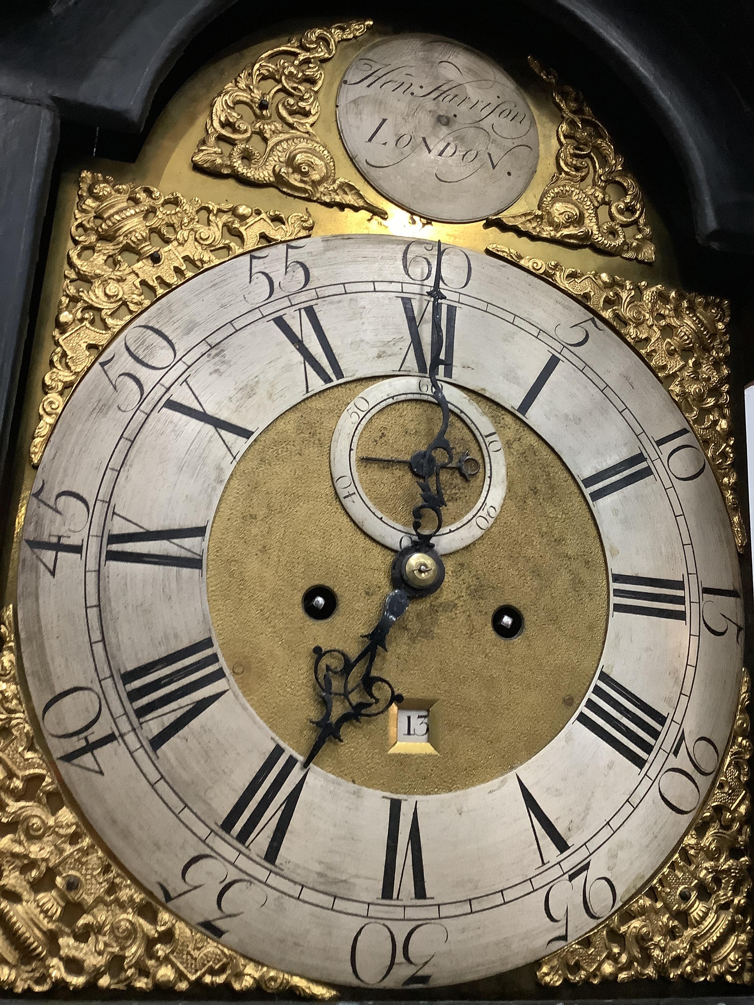 An early 18th century chinoiserie lacquer eight day longcase clock, the arched dial marked Henry Harrison, London, height 245cm